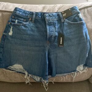 Mid rise boyfriend style distressed jean shorts